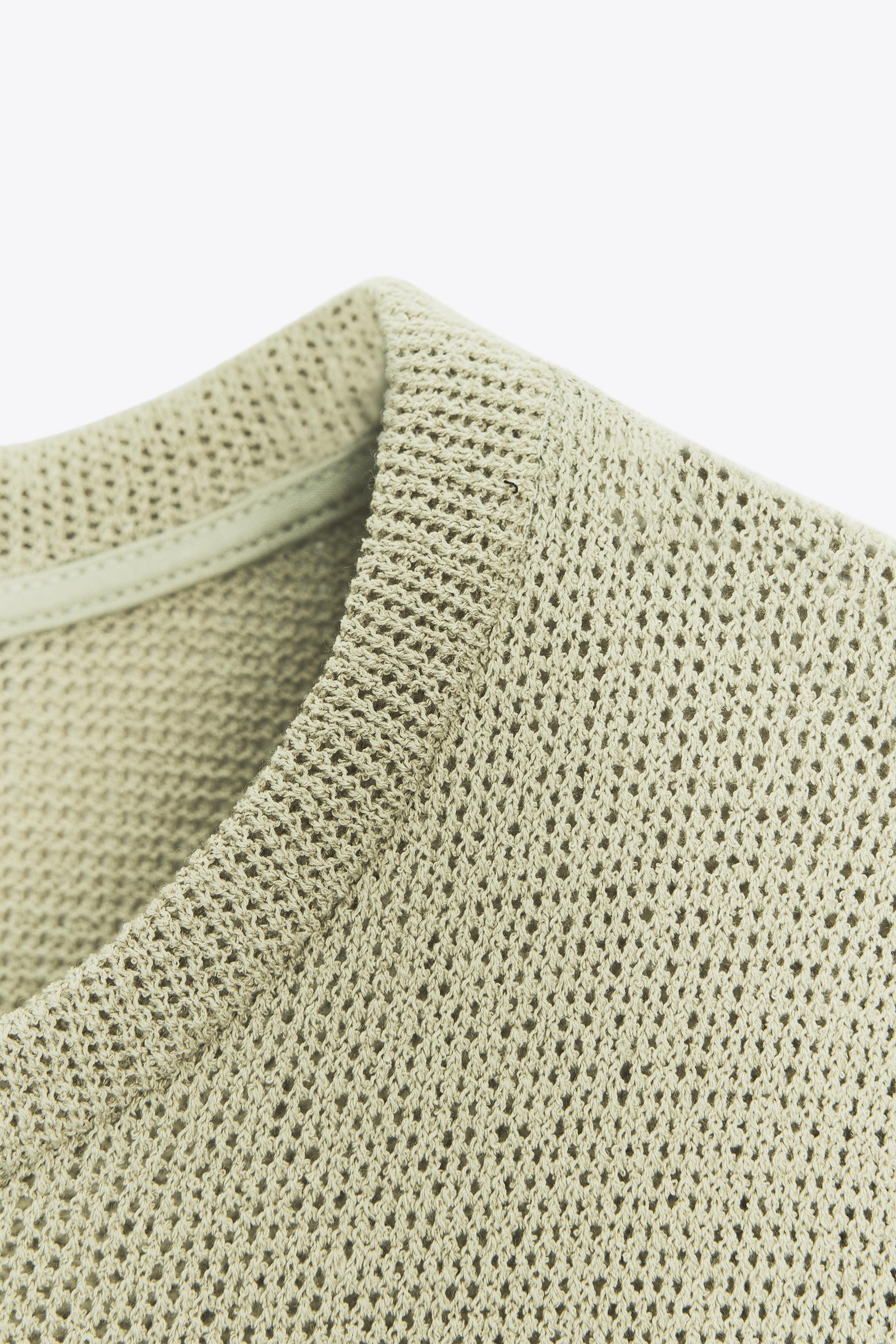 CUT-OUT KNIT SWEATER